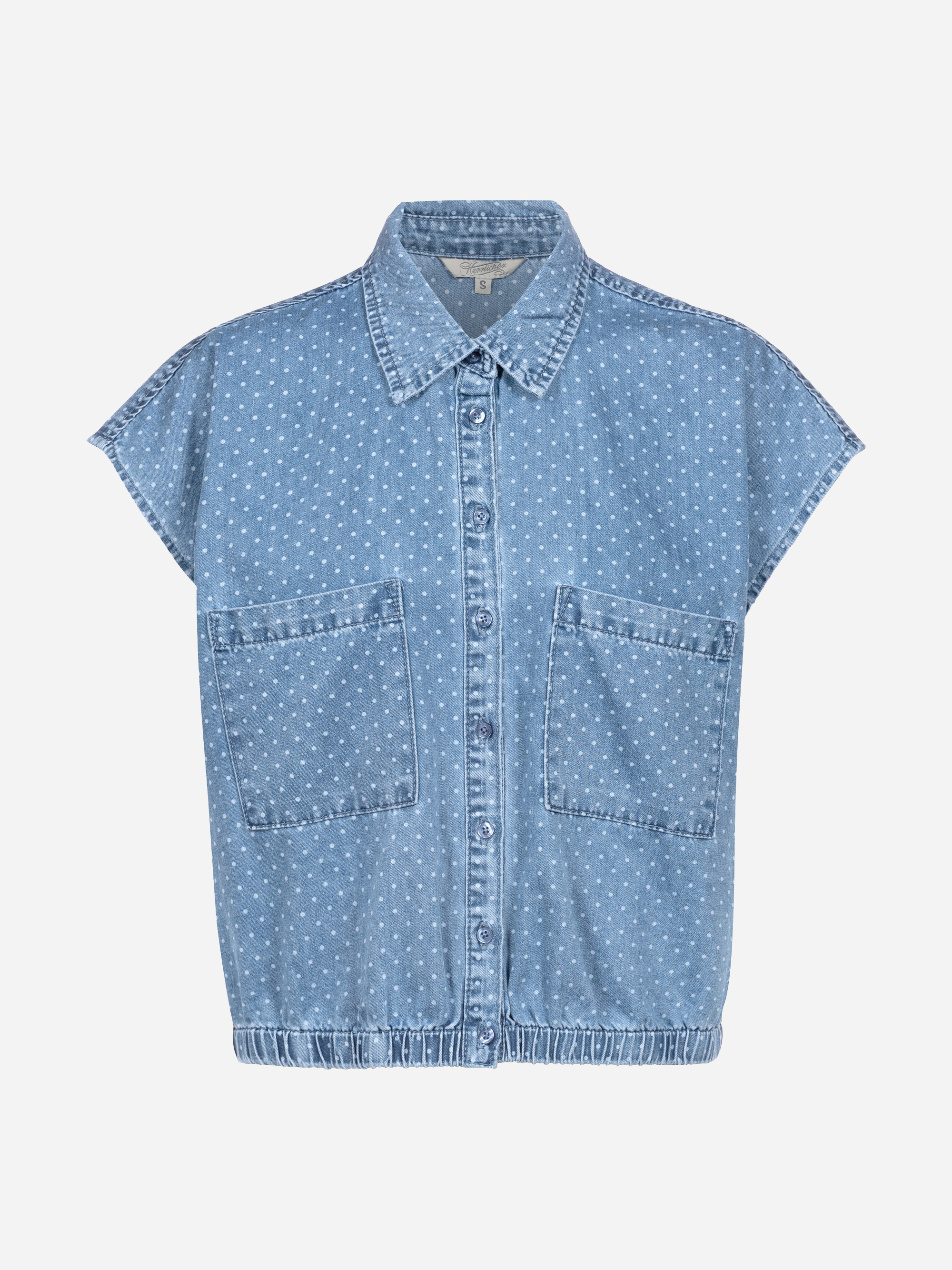 Ärmelloses Jeanshemd mit Kragen, Knopfverschluss vorne, zwei großen Taschen vorne, kleinem weißen Tupfenmuster und elastischem Saum.