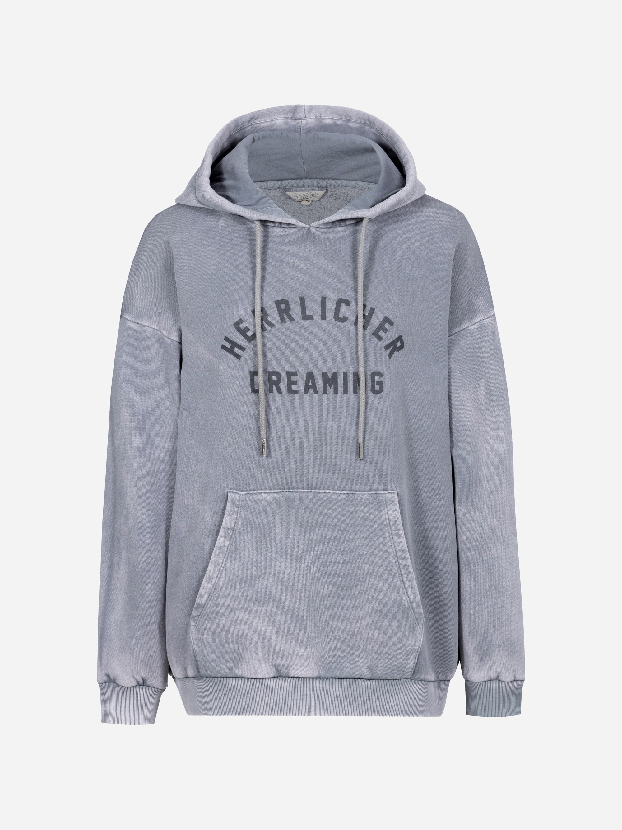 Hellgrauer, säuregewaschener Kapuzenpulli mit Fronttasche und Kapuze mit Kordelzug. Der Text HEARLICHER DREAMING ist in fetten, dunklen Buchstaben quer über die Brust gedruckt.
